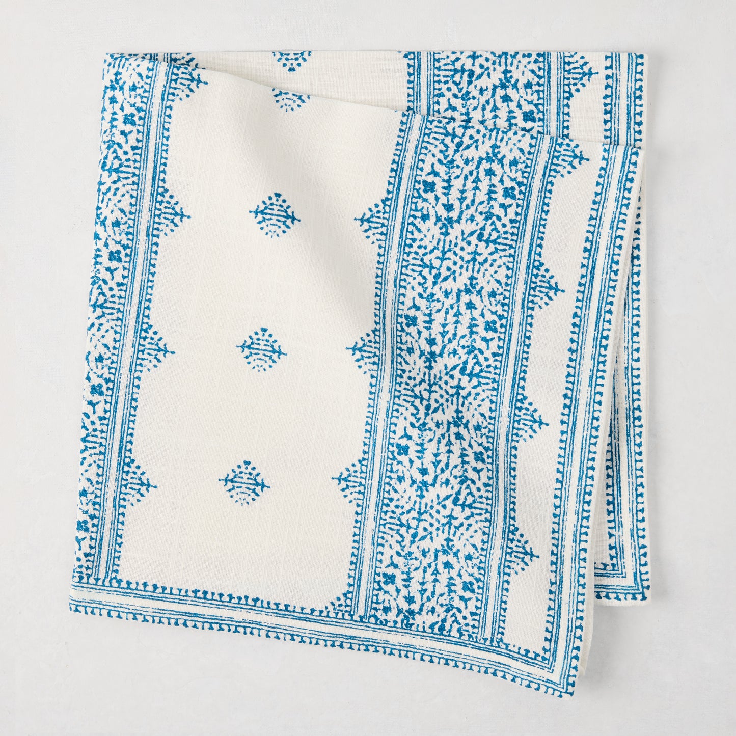 Peter Dunham + Hudson Grace Blue Fez Stripe Printed Napkin, 100% cotton slub, folded.