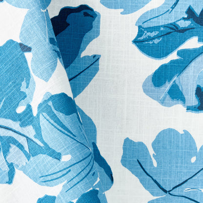 Peter Dunham + Hudson Grace blue fig leaf print on textured white cotton slub tablecloth fabric.