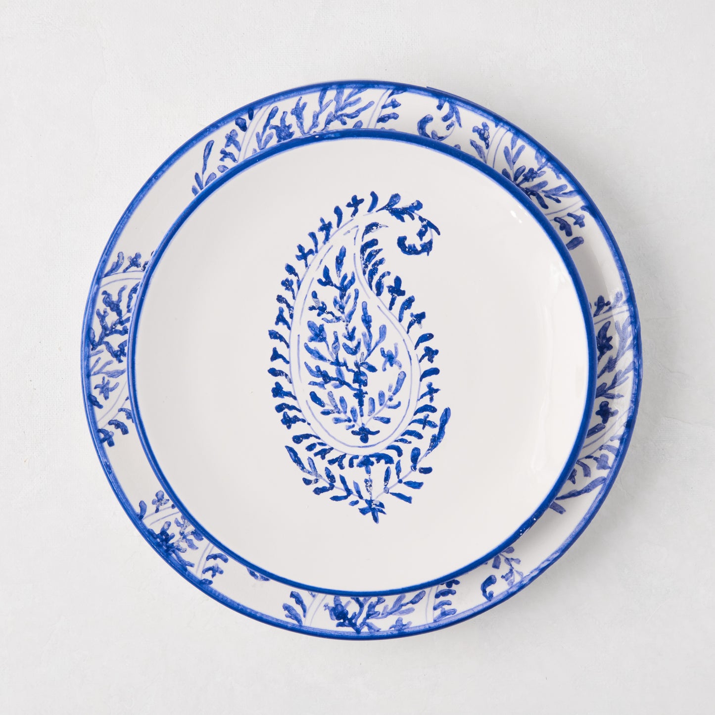 Peter Dunham + Hudson Grace Blue Hand-Painted Kashmir Paisley Appetizer Plate, white with blue paisley design.