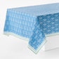 Peter Dunham blue and white cotton slub rectangular tablecloth with a floral Jaali print and green border.