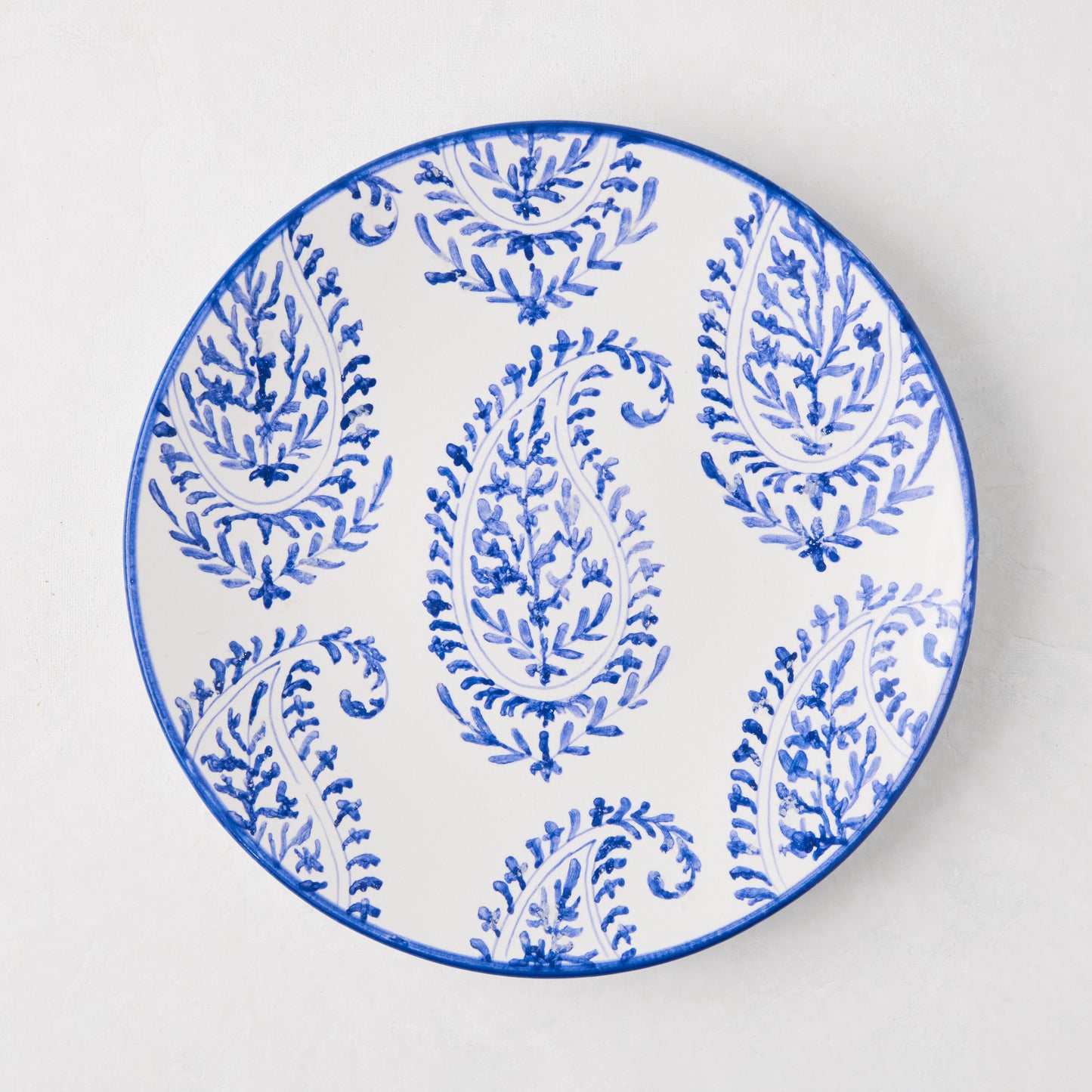 Peter Dunham + Hudson Grace Blue Kashmir hand-painted paisley salad plate, white with blue design.