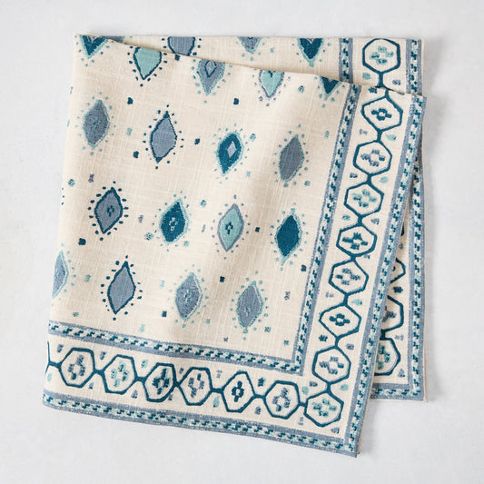 Peter Dunham + Hudson Grace Blue Oona printed cotton slub napkin with tribal motif and bold border.
