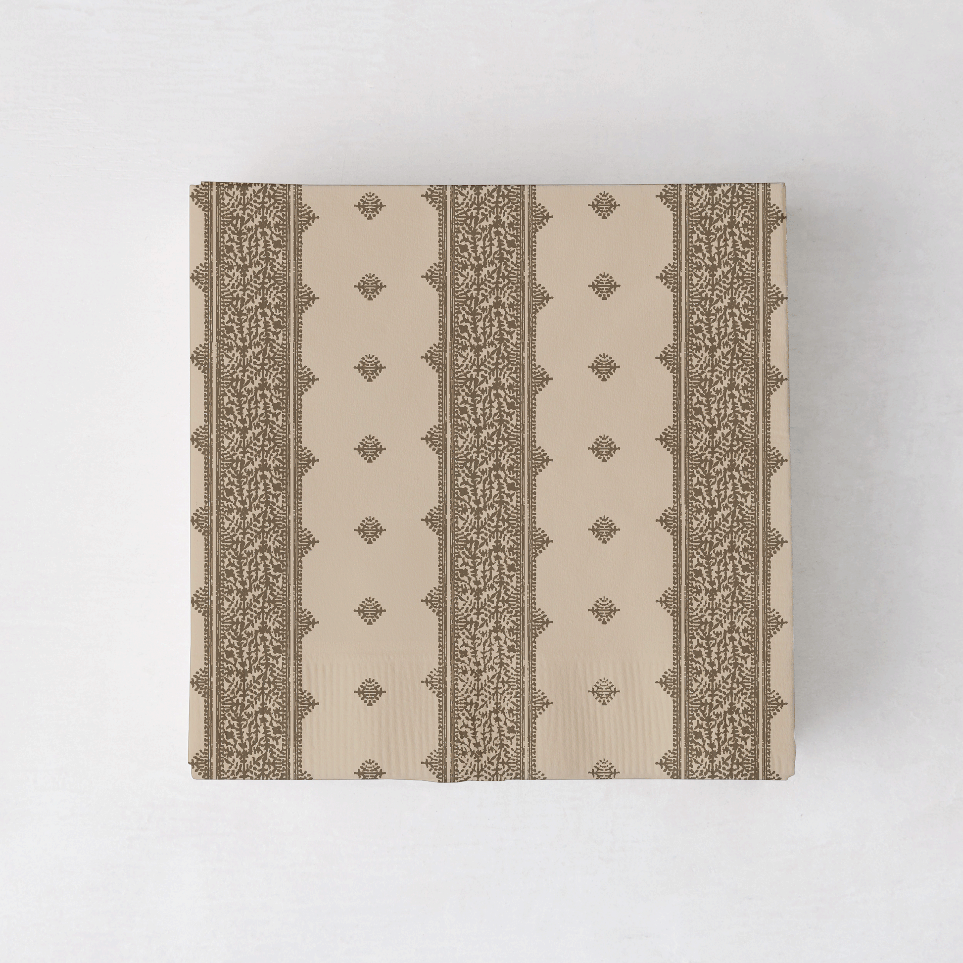 Peter Dunham + Hudson Grace Deeg cocktail napkins, beige with brown patterned stripes.