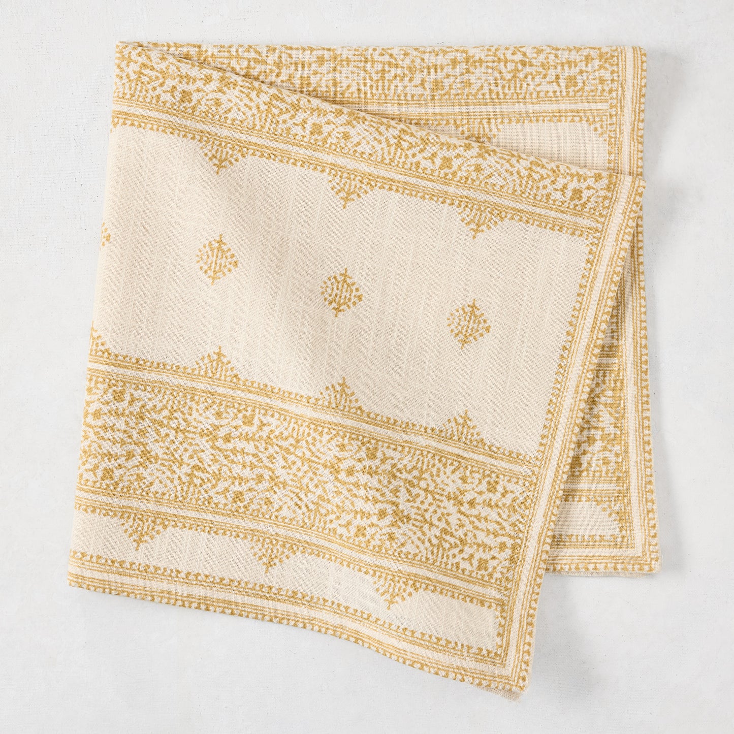 Peter Dunham + Hudson Grace Golden Yellow Fez Stripe printed natural cotton slub napkin, folded.