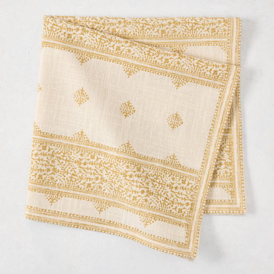 Peter Dunham + Hudson Grace Golden Yellow Fez Stripe printed natural cotton slub napkin, folded.