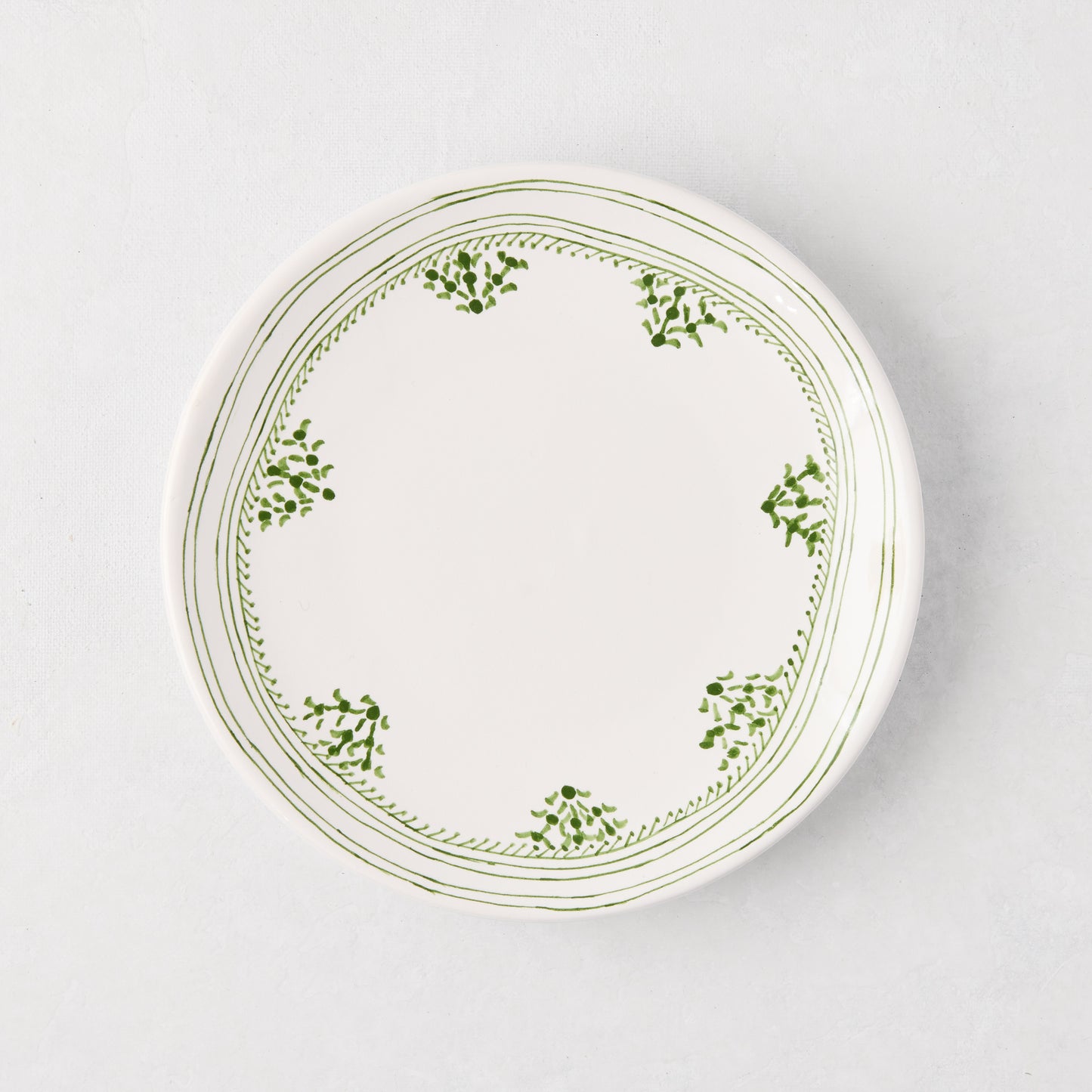 Peter Dunham + Hudson Grace Green Fez hand-painted border appetizer plate, white with green pattern.