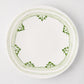 Peter Dunham + Hudson Grace Green Fez hand-painted border dinner plate, white with green pattern.