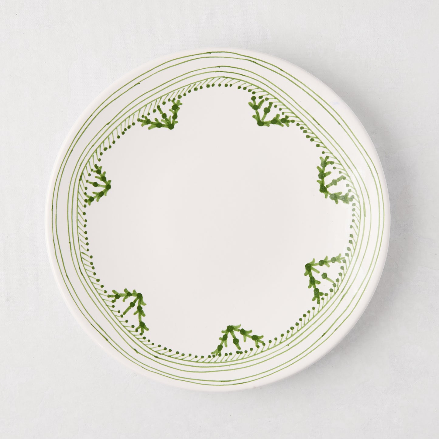 Peter Dunham + Hudson Grace Green Fez hand-painted border salad plate, white with green pattern.