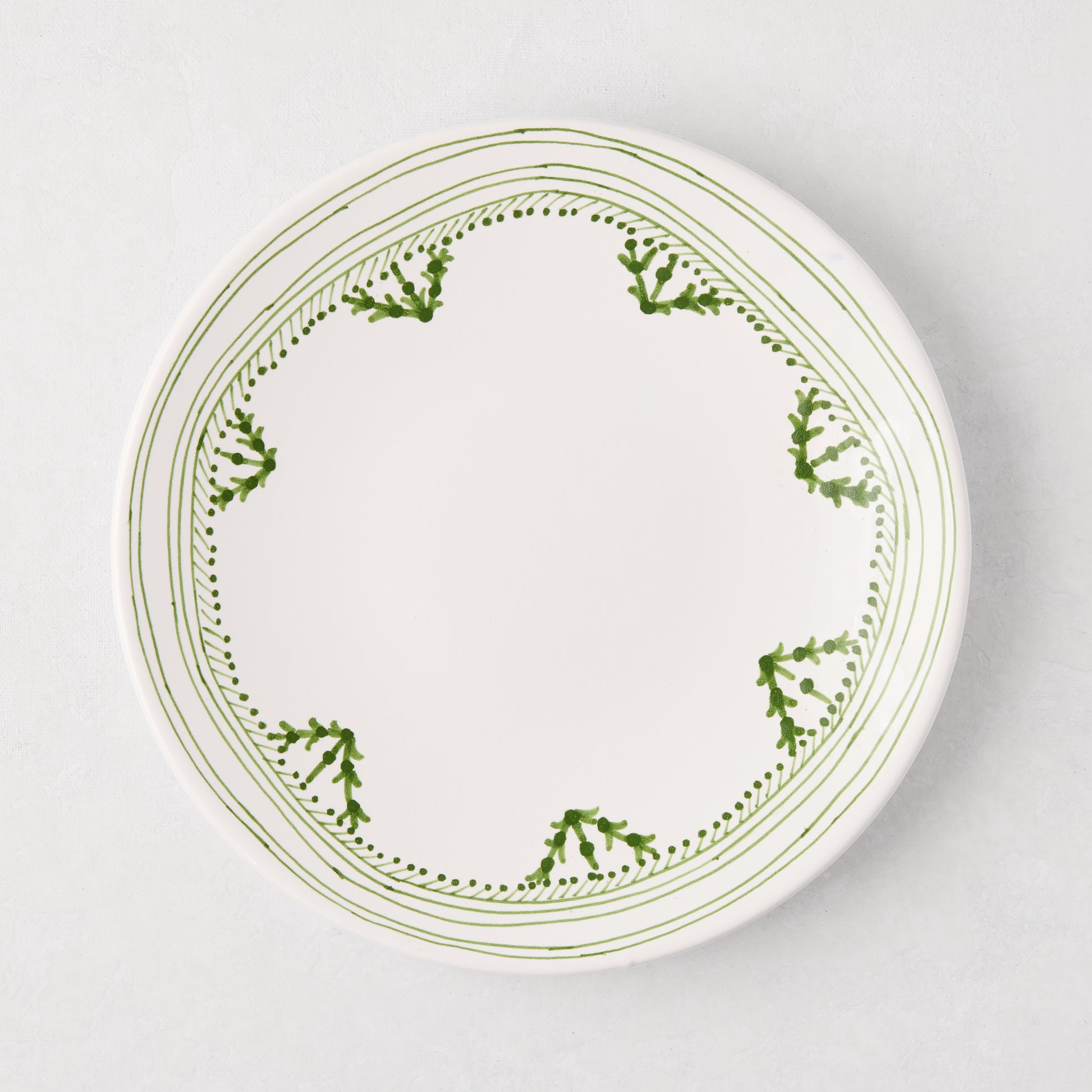 Peter Dunham + Hudson Grace Green Fez hand-painted border salad plate, white with green pattern.