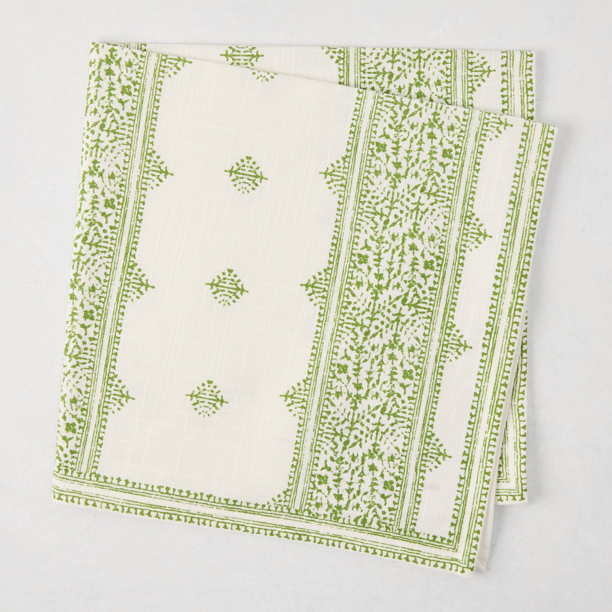 Peter Dunham + Hudson Grace Green Fez Stripe Printed Napkin, 100% cotton slub, folded.