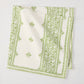 Peter Dunham + Hudson Grace Green Fez Stripe printed cotton slub napkin, folded.