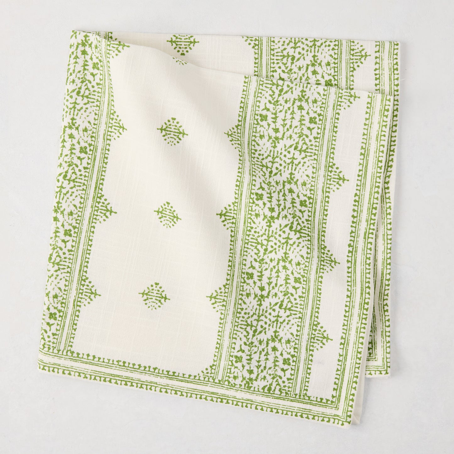 Peter Dunham + Hudson Grace Green Fez Stripe printed cotton slub napkin, folded.