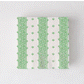 Peter Dunham + Hudson Grace Fez cocktail napkins, white with green intricate stripe pattern.