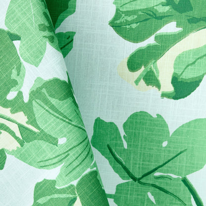Peter Dunham + Hudson Grace cotton slub tablecloth with green fig leaf print on a pale blue background.