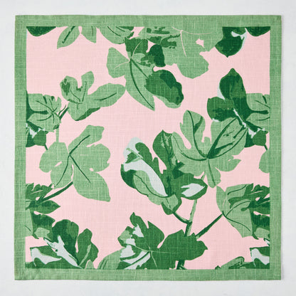 Peter Dunham + Hudson Grace Green Fig Leaf printed pale pink cotton slub napkin with green border.