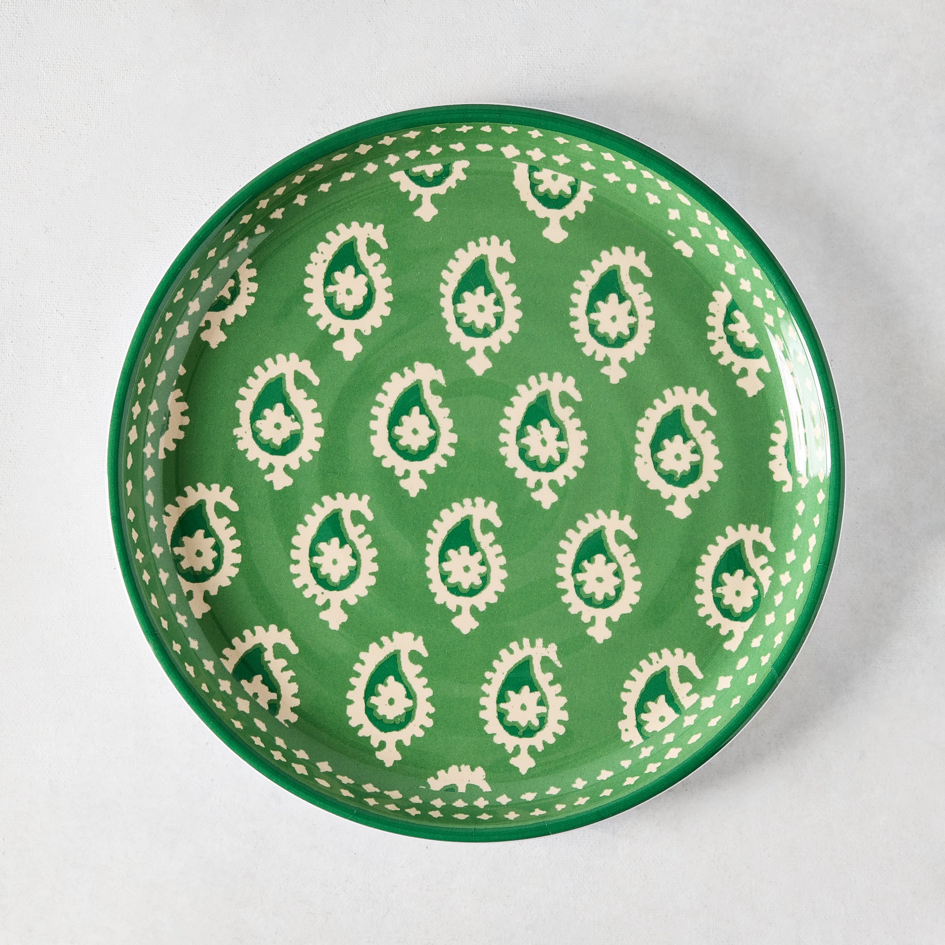 Peter Dunham + Hudson Grace Green Janpath Melamine Salad Plate with paisley pattern and graphic border.