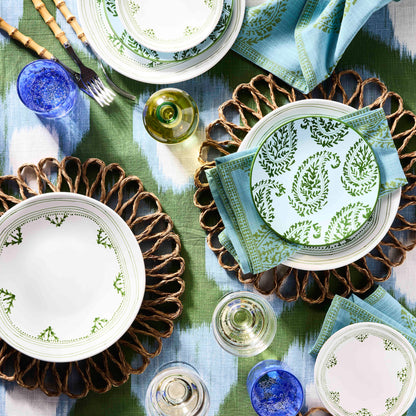 Peter Dunham + Hudson Grace Green Kashmir Paisley printed napkin on a table setting.