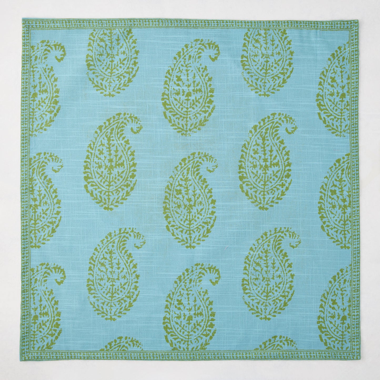 Peter Dunham + Hudson Grace Green Kashmir Paisley Printed Napkin, blue with green paisley pattern.