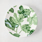 Peter Dunham + Hudson Grace white ceramic salad plate with hand-painted green fig leaf pattern.
