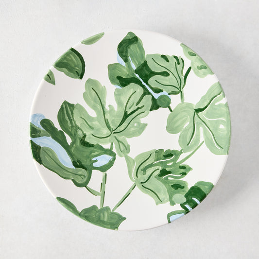 Peter Dunham + Hudson Grace white ceramic salad plate with hand-painted green fig leaf pattern.