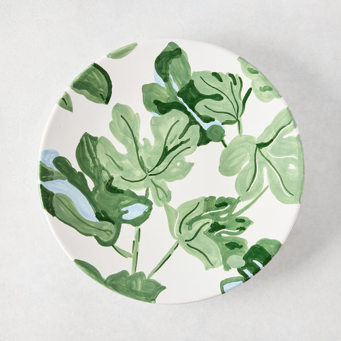 Peter Dunham + Hudson Grace white ceramic salad plate with hand-painted green fig leaf pattern.