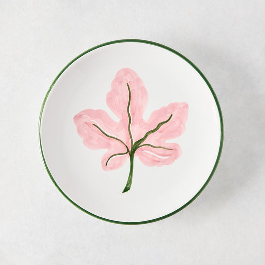 Peter Dunham + Hudson Grace hand-painted white appetizer plate with pink fig leaf and green border.