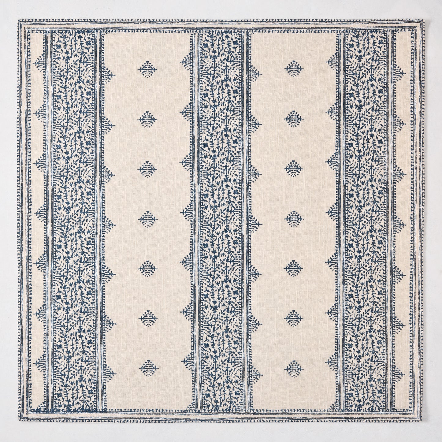 Peter Dunham + Hudson Grace Indigo Blue Fez Stripe printed natural cotton napkin with vintage embroidery pattern.
