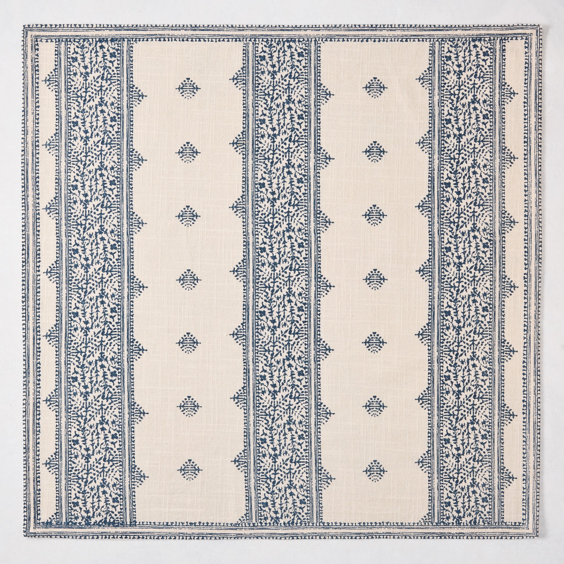 Peter Dunham + Hudson Grace Indigo Blue Fez Stripe printed natural cotton napkin with vintage embroidery pattern.