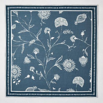 Peter Dunham + Hudson Grace Indigo Blue Indian Chintz cotton slub napkin with floral and border pattern.