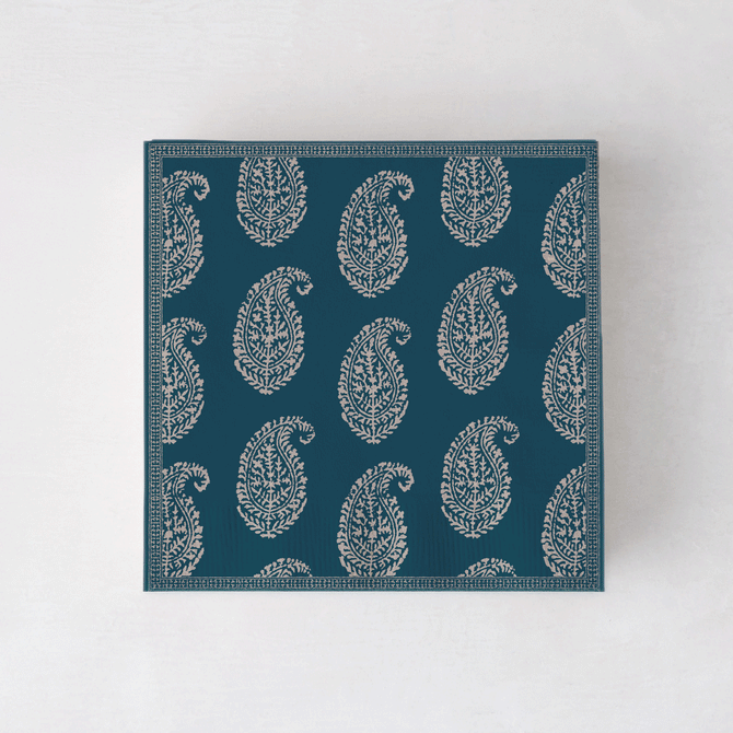 Peter Dunham + Hudson Grace Kashmir cocktail napkins, dark teal with light paisley pattern.