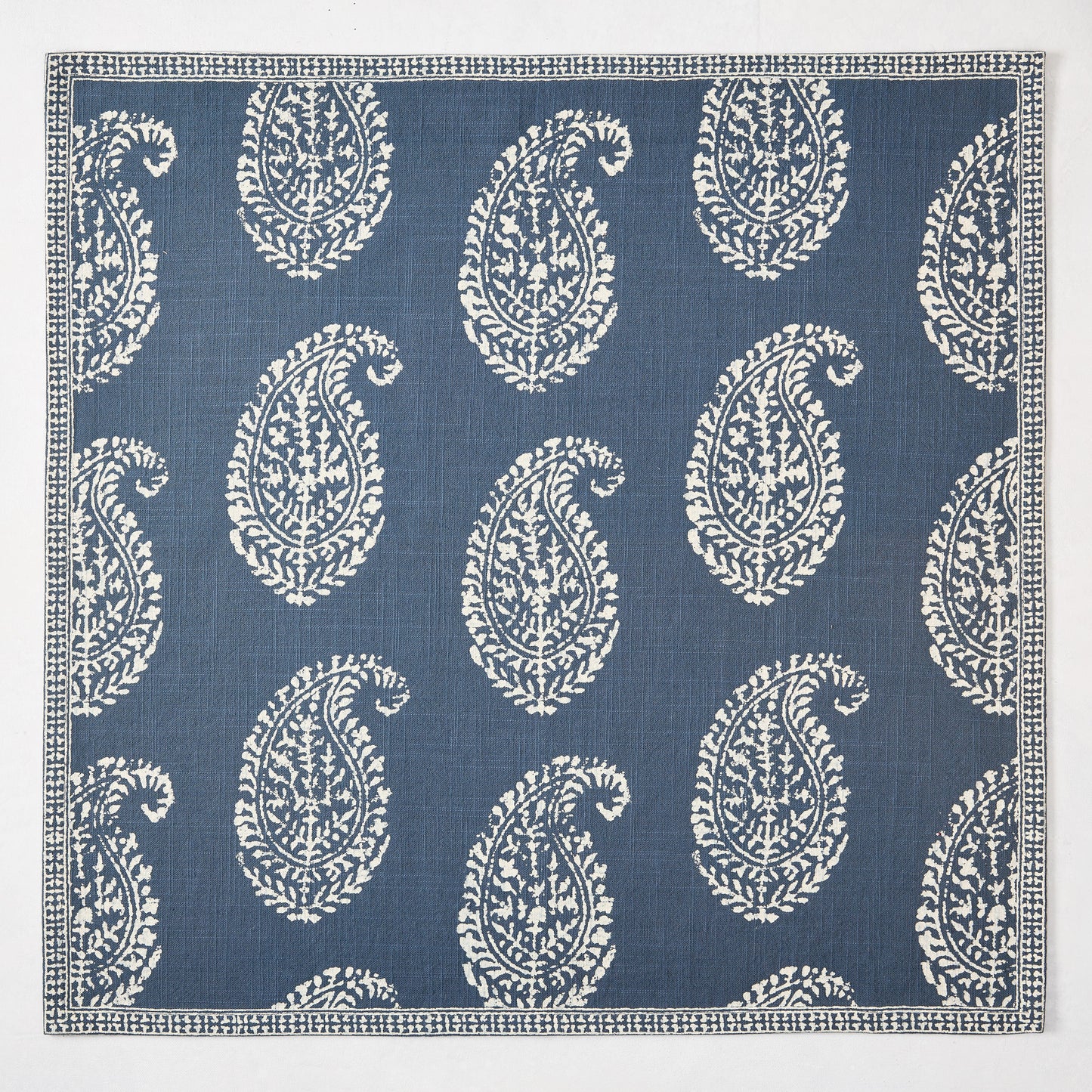 Peter Dunham + Hudson Grace Kashmir Paisley Indigo Blue Printed Napkin with white motif.