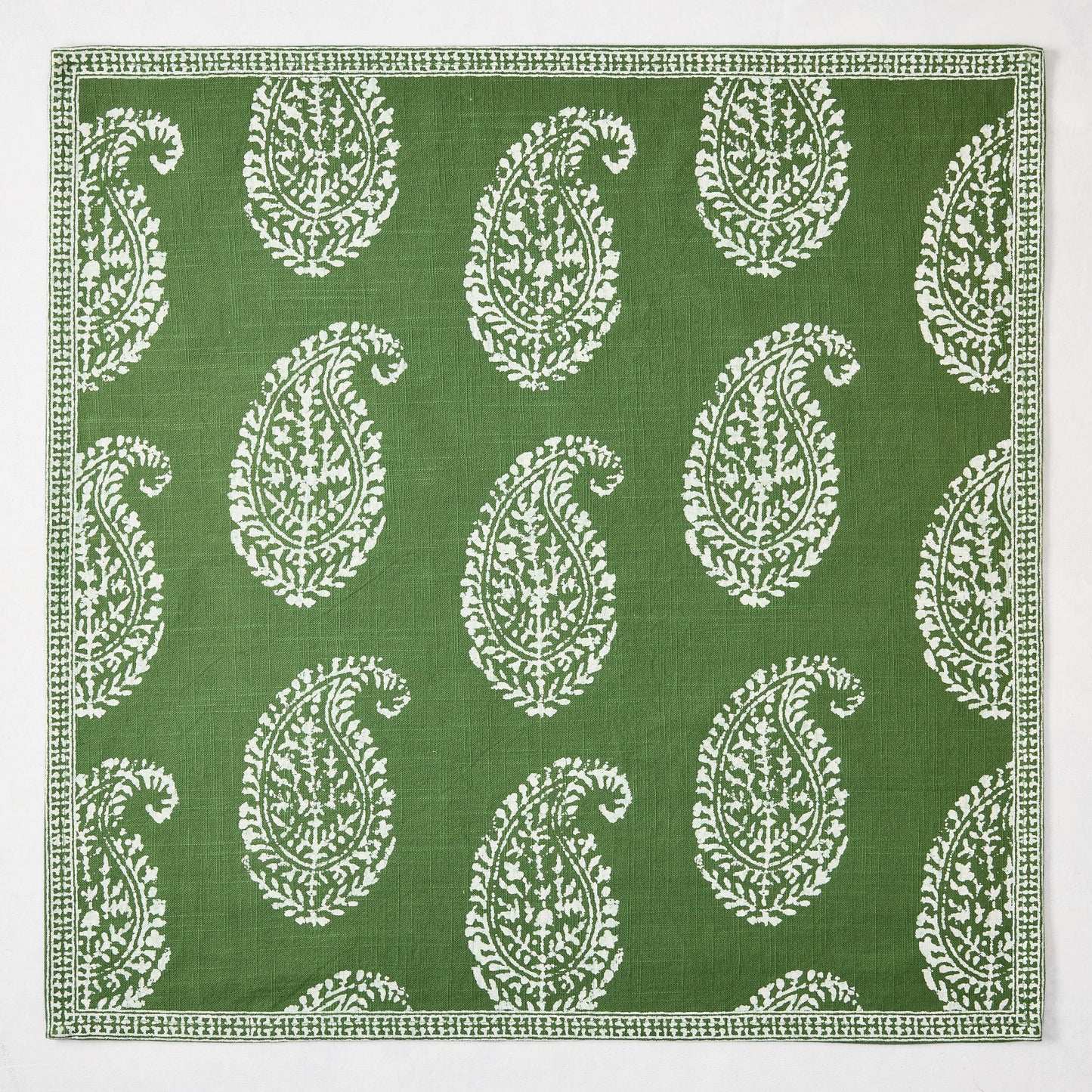 Peter Dunham + Hudson Grace Kashmir Paisley Olive Green Printed Napkin with white motif.