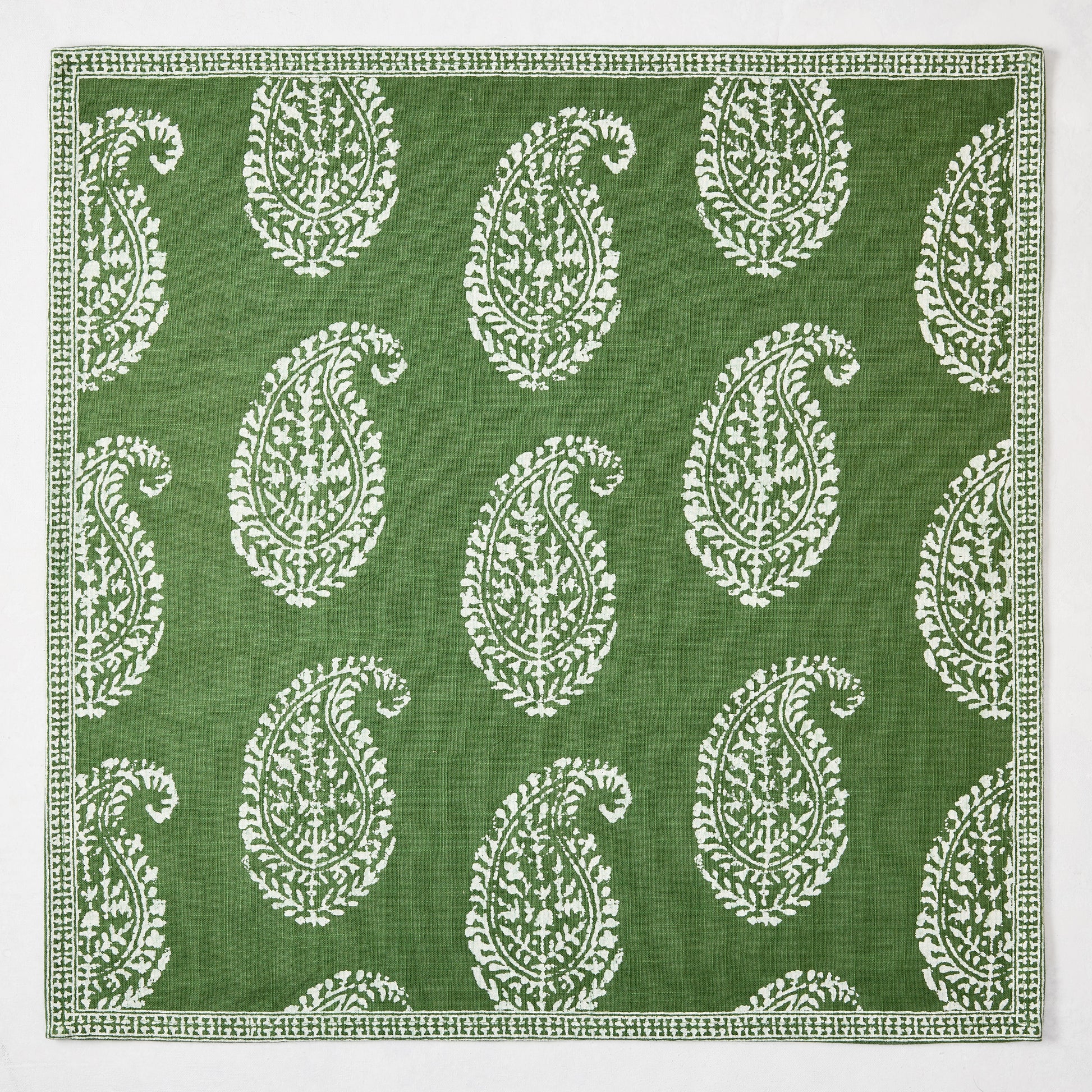 Peter Dunham + Hudson Grace Kashmir Paisley Olive Green Printed Napkin with white motif.