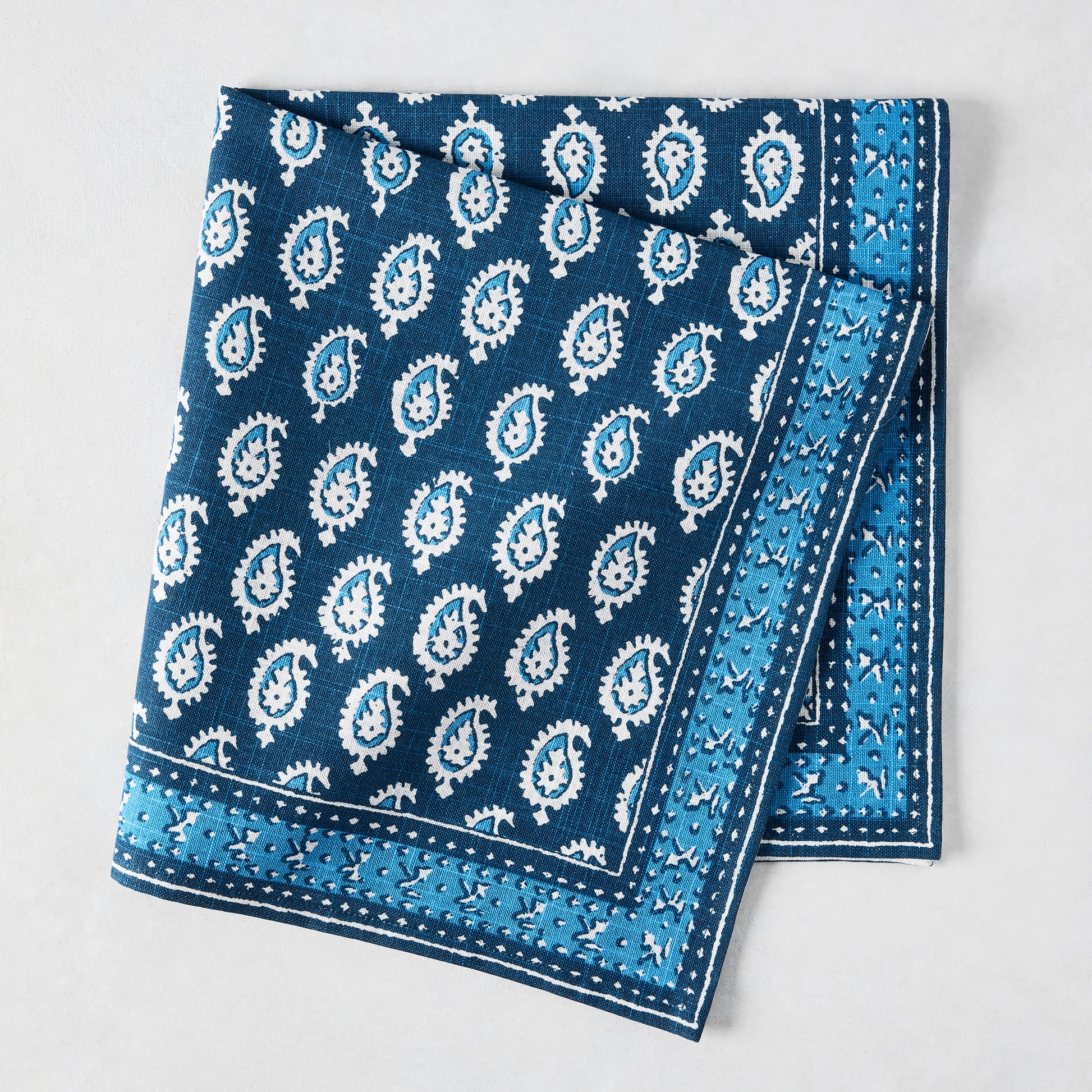 Peter Dunham + Hudson Grace Navy Blue Janpath Printed Napkin, 100% cotton slub with paisley and graphic border.