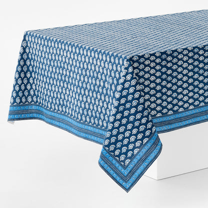 Navy blue 108x70-inch cotton slub tablecloth with white paisley print and graphic border by Peter Dunham + Hudson Grace.