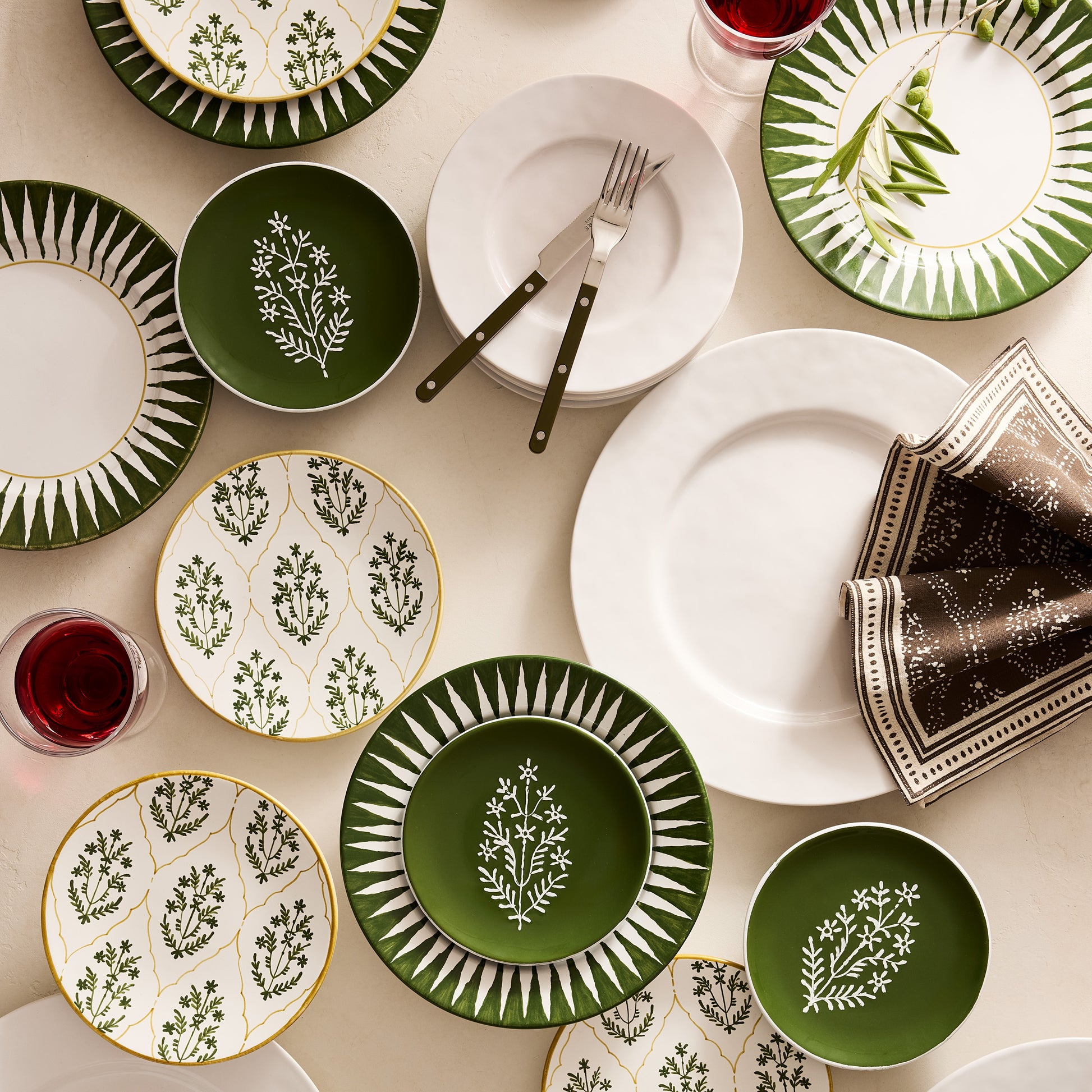 Peter Dunham + Hudson Grace Olive Green Hand-Painted Jaali Salad Plate with yellow border, surrounded by coordinating dinnerware.