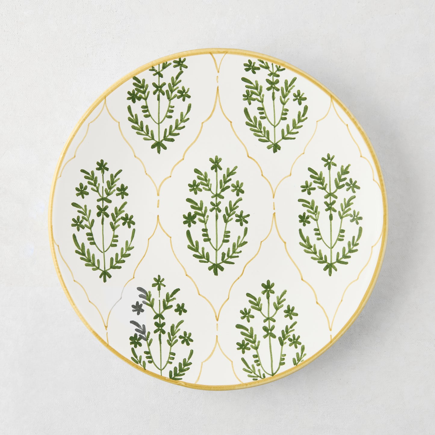 Peter Dunham + Hudson Grace Olive Green Hand-Painted Jaali Salad Plate with yellow border and floral pattern.