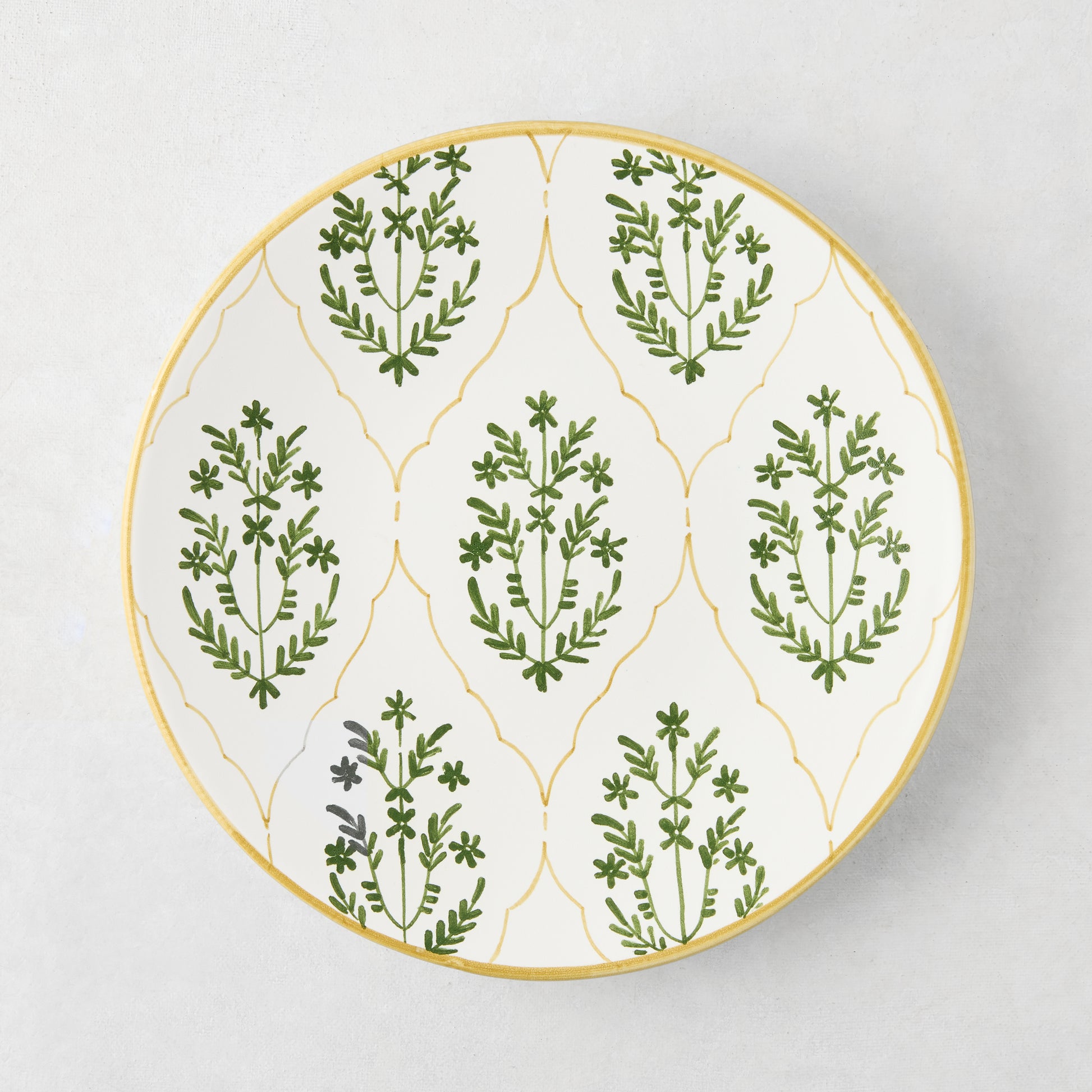 Peter Dunham + Hudson Grace Olive Green Hand-Painted Jaali Salad Plate with yellow border and floral pattern.