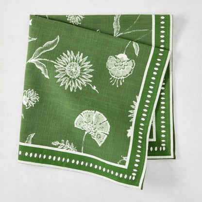 Olive green cotton slub napkin with white Indian chintz floral print and dotted border.