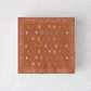 Peter Dunham + Hudson Grace Oona cocktail napkins with tribal motif in orange, pink, and yellow.