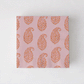 Peter Dunham + Hudson Grace Orange Kashmir cocktail napkins with paisley print.