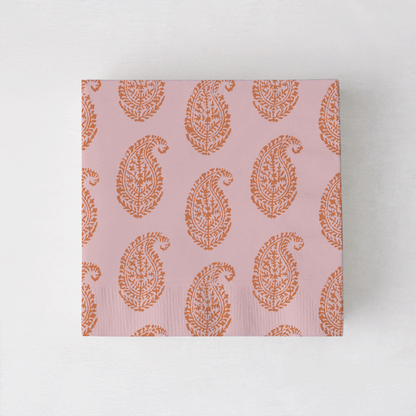 Peter Dunham + Hudson Grace Orange Kashmir cocktail napkins with paisley print.