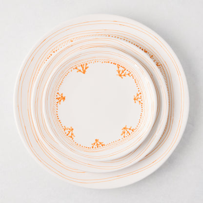 White Peter Dunham + Hudson Grace Orange Fez hand-painted border appetizer plate, top-down view.
