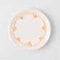 Peter Dunham + Hudson Grace Orange Fez hand-painted border appetizer plate, white with orange pattern.