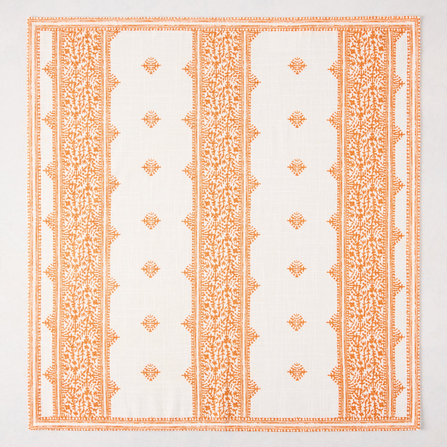 Peter Dunham + Hudson Grace Orange Fez Stripe printed cotton slub napkin with intricate pattern.