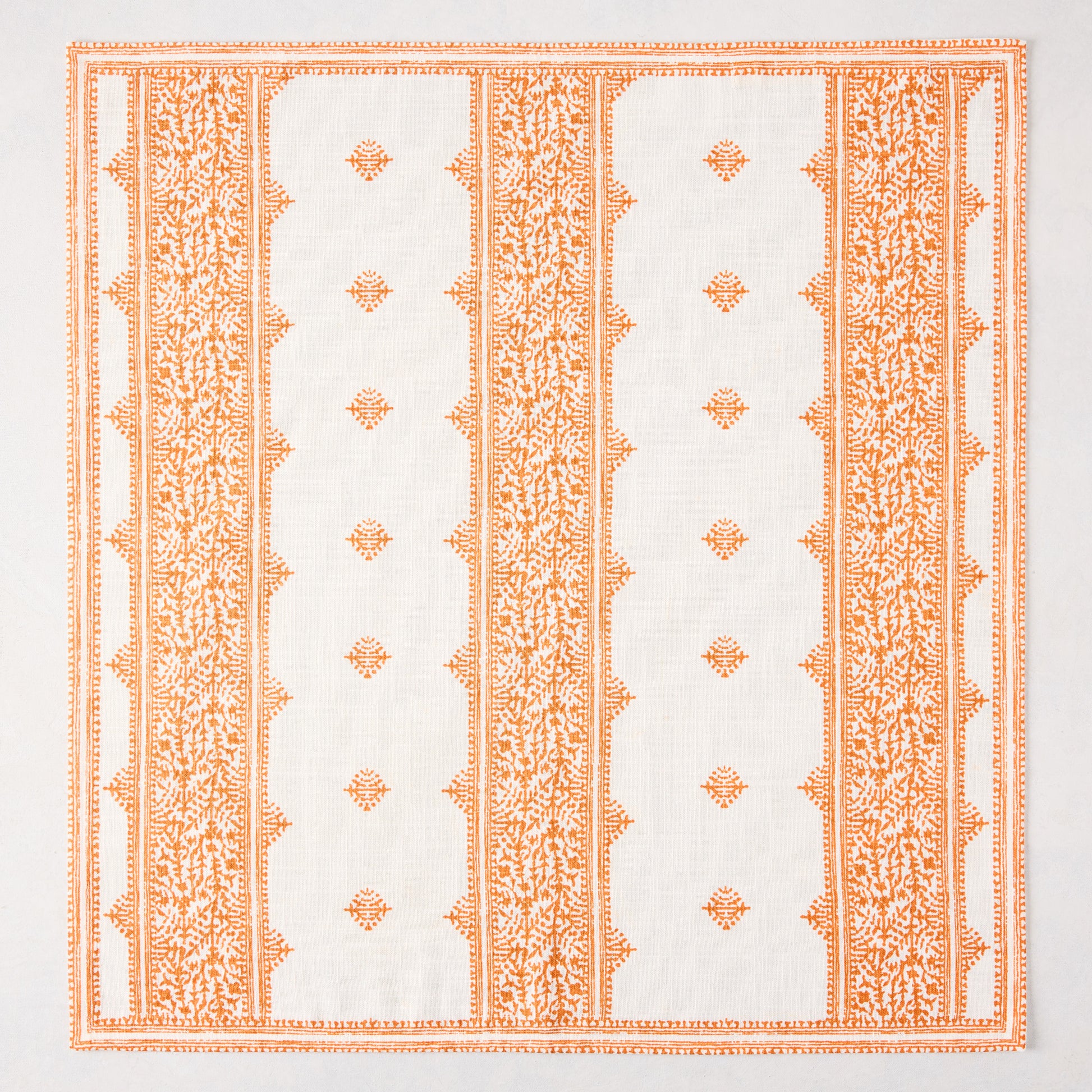 Peter Dunham + Hudson Grace Orange Fez Stripe printed cotton slub napkin with intricate pattern.