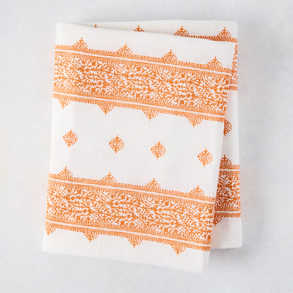 Peter Dunham + Hudson Grace Orange Fez Stripe printed tablecloth, 100% cotton slub, folded.