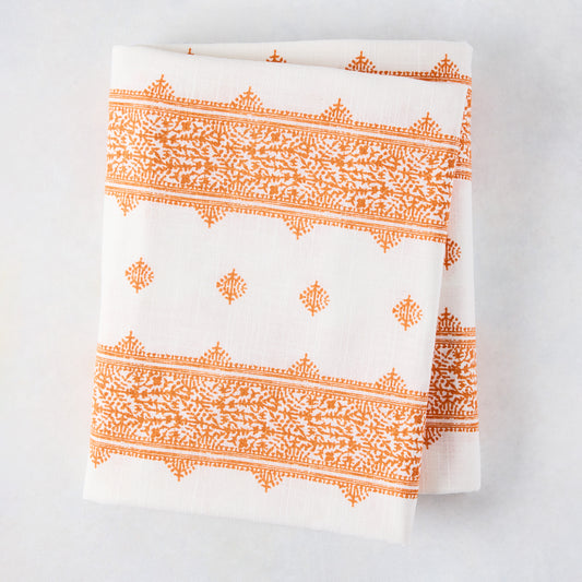 Peter Dunham + Hudson Grace Orange Fez Stripe printed tablecloth, 100% cotton slub, folded.