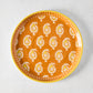 Peter Dunham + Hudson Grace Orange Janpath Melamine Salad Plate with paisley pattern and graphic border.