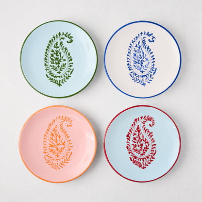 Four Peter Dunham + Hudson Grace hand-painted appetizer plates with colorful paisley designs.
